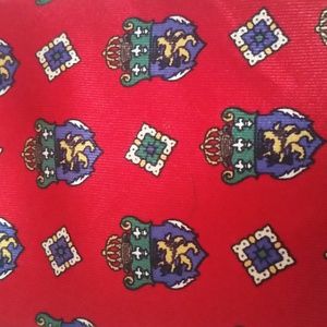 Gently used Tommy Hilfiger red tie w/ knight crest